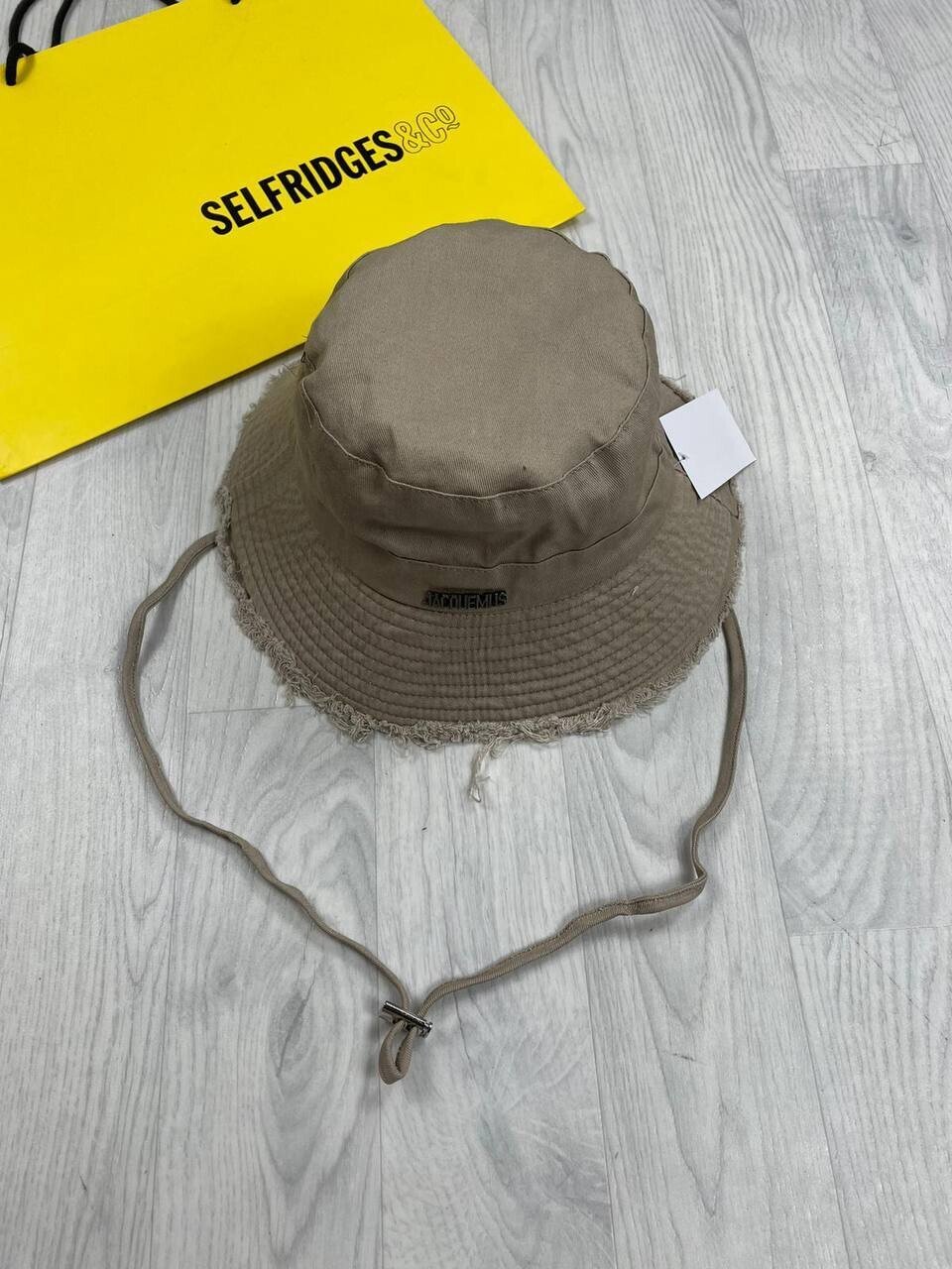 3649753028.jpg Jacquemus Women Bucket Hat String Replica Cotton Women's Luxury Fake Hats Reps Logo Plaque Adjustable Cheap Boonie Ladies Caps First Copy Rep Off Coffee Brown Sale UK - Image 1