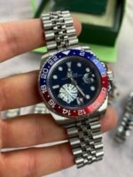 Rolex GMT Master II Black Dial Watch in Silver Chain Strap with Red/Blue Bezel - Image 2