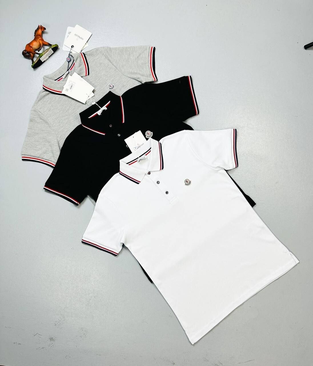 4270899360.jpg MONCLER POLO SHIRTS in Different Colors - Image 1