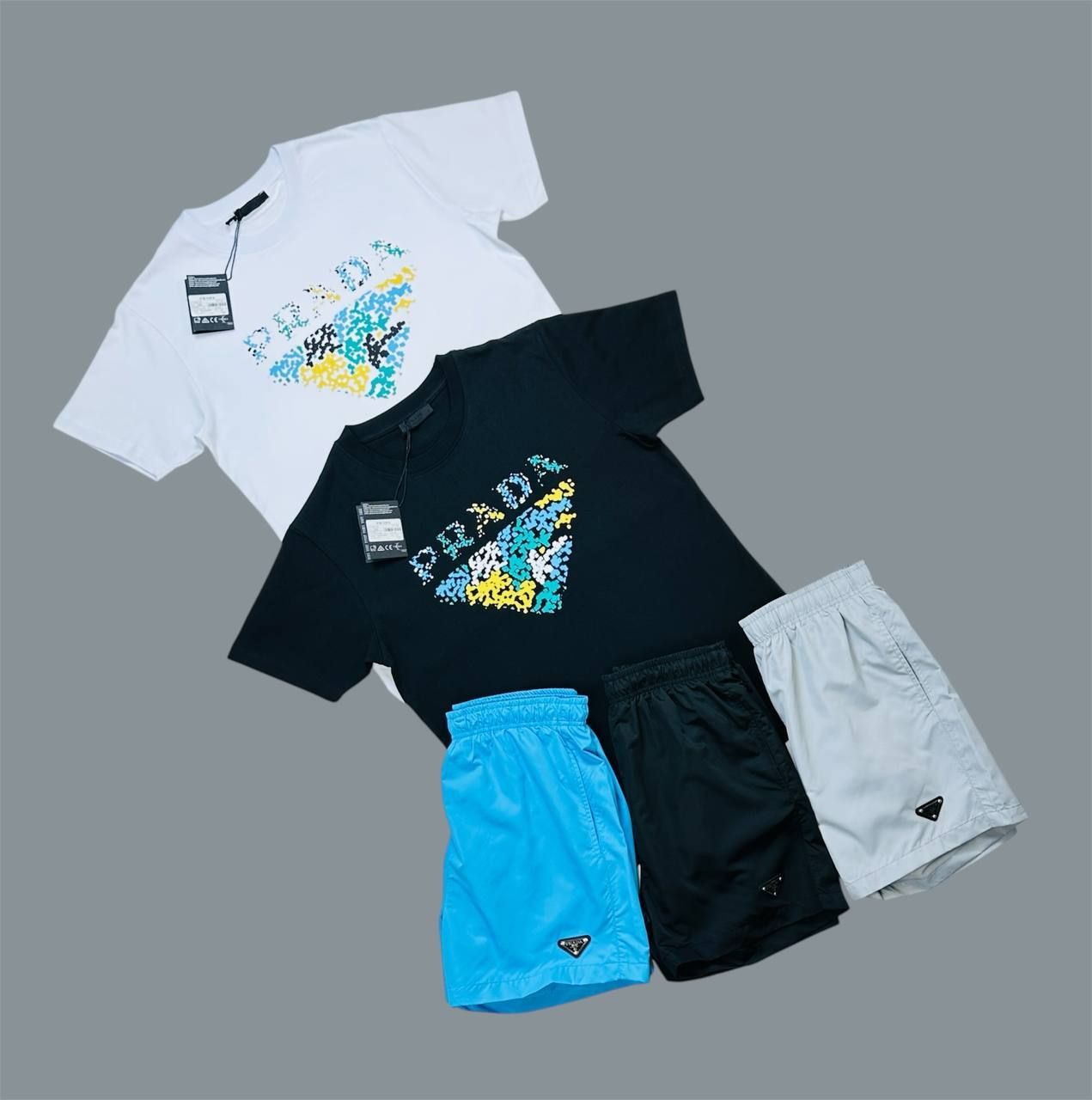 5062544125.jpg Prada Multi Color Pixel Print T-Shirts & Shorts Sets For Men's in Different Colors - Image 1